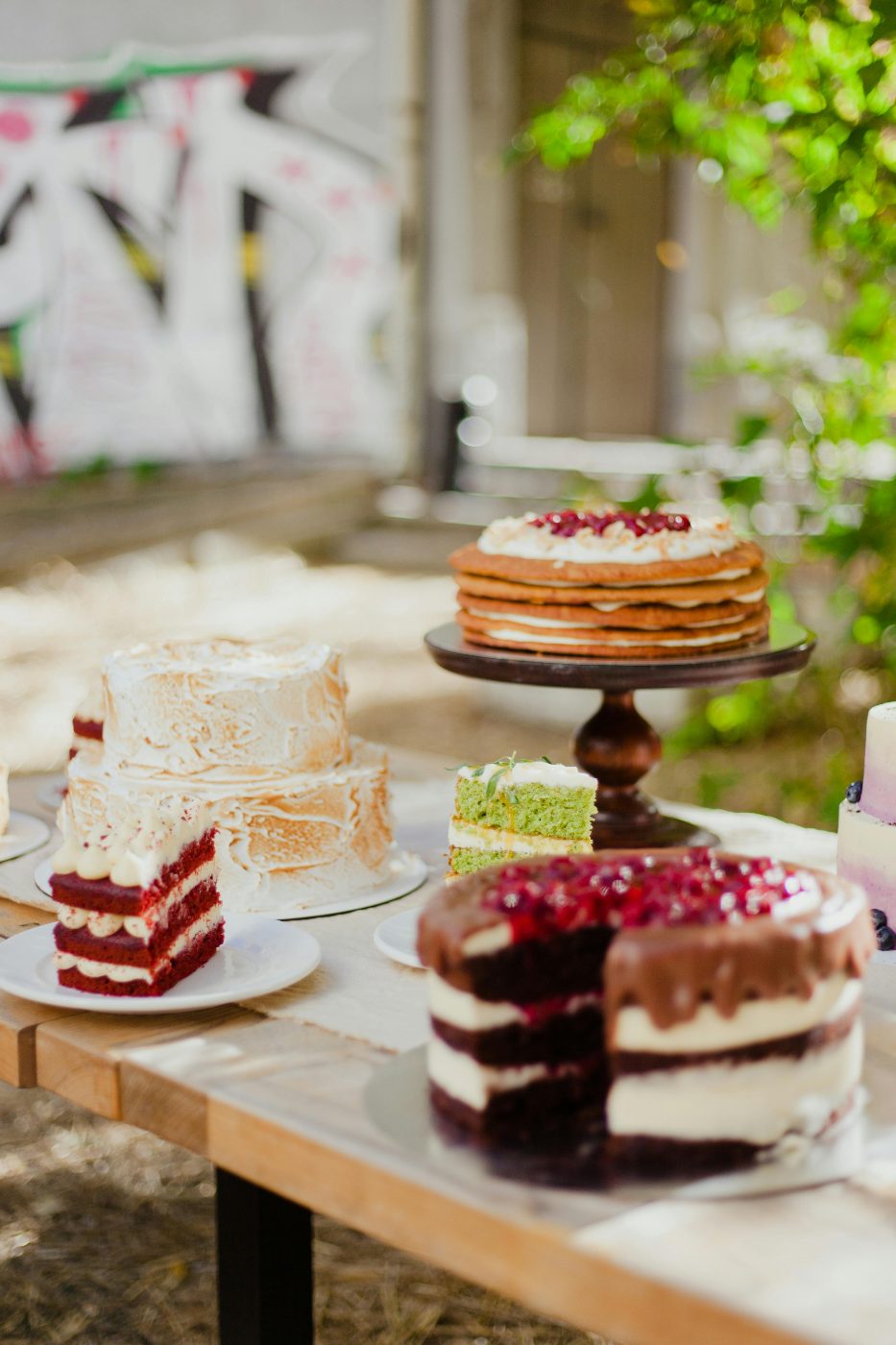 Bakery counter lined with decorated cakes